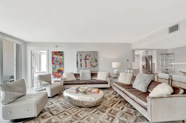 a living room with furniture and a couch