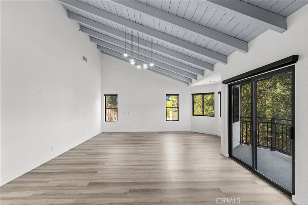 106 Buckskin Road Bell Canyon, CA 91307 - Photo 17 of 54 a view of empty room with wooden floor and fan