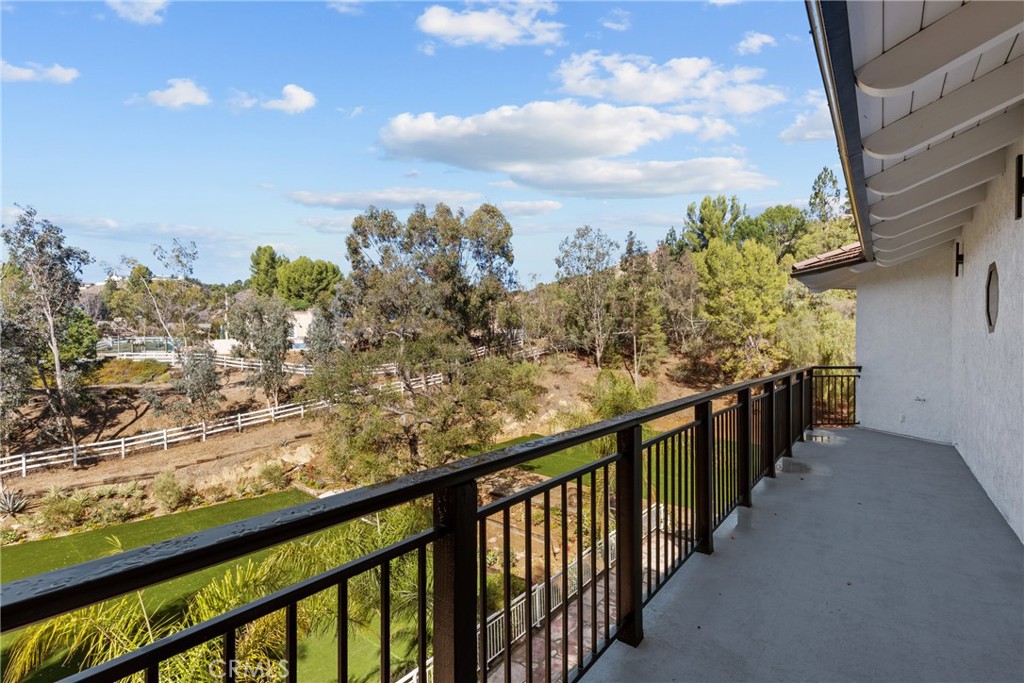 106 Buckskin Road Bell Canyon, CA 91307 - Photo 18 of 54 a view of a balcony with wooden floor