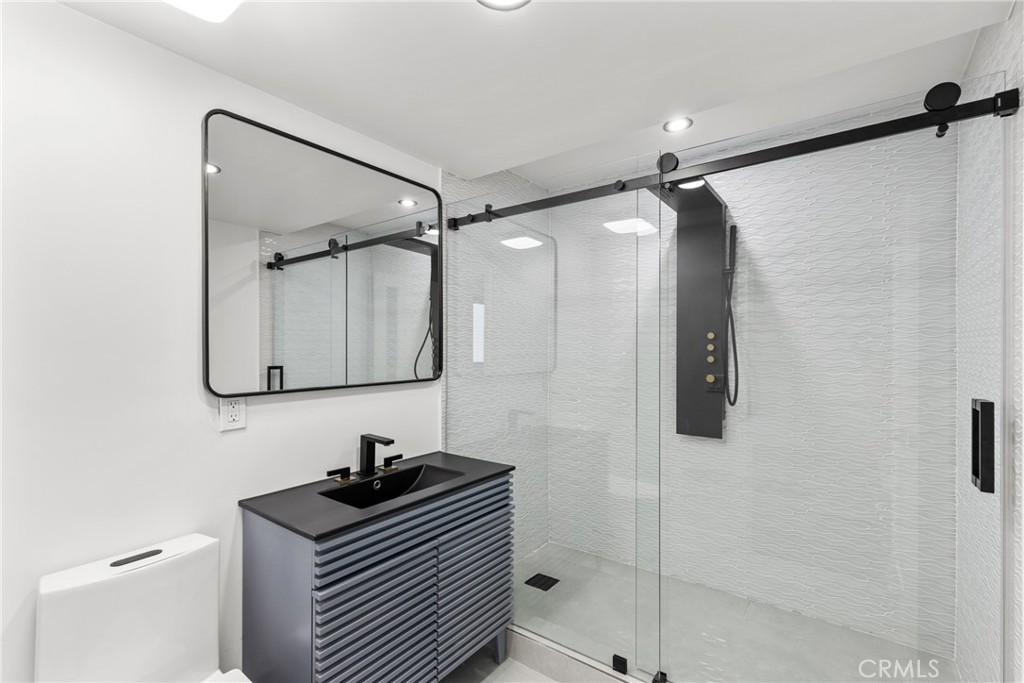 106 Buckskin Road Bell Canyon, CA 91307 - Photo 27 of 54 a bathroom with a shower and a sink