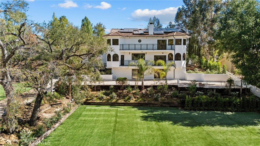 106 Buckskin Road Bell Canyon, CA 91307 - Photo 35 of 54 a aerial view of a house with a garden