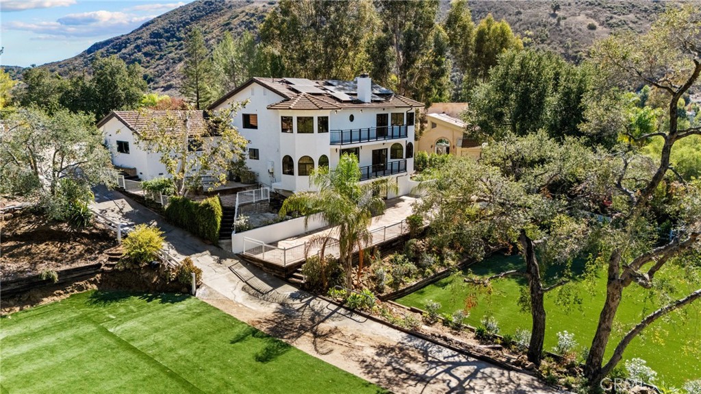 106 Buckskin Road Bell Canyon, CA 91307 - Photo 36 of 54 an aerial view of a house with a garden
