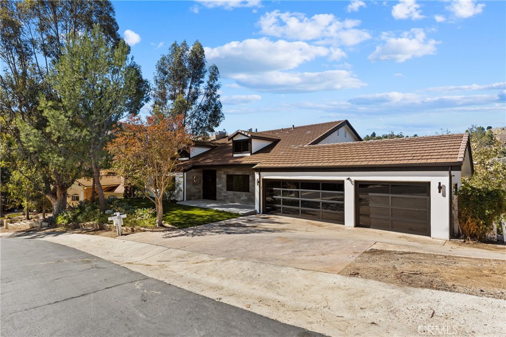 106 Buckskin Road Bell Canyon, CA 91307 - Photo 43 of 54 front view of a house with a yard