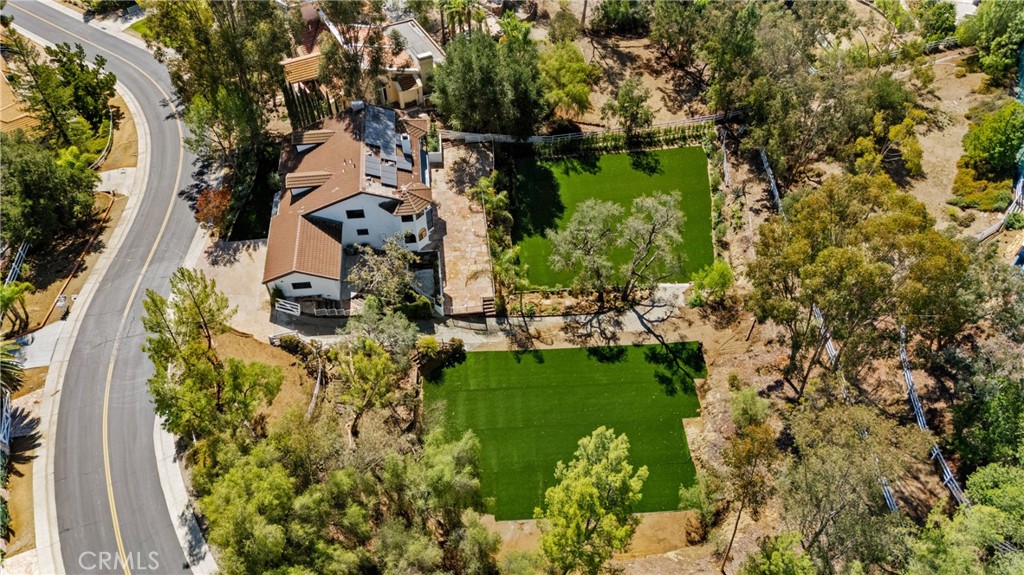 106 Buckskin Road Bell Canyon, CA 91307 - Photo 45 of 54 a view of a lake with a house in a yard