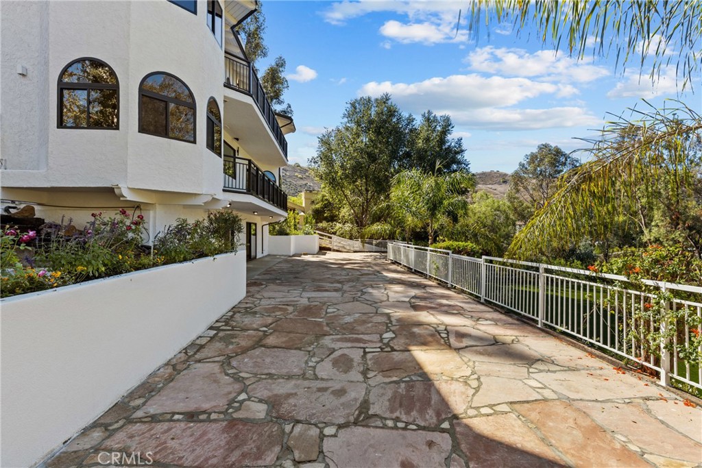 106 Buckskin Road Bell Canyon, CA 91307 - Photo 49 of 54 a view of a house with a small yard