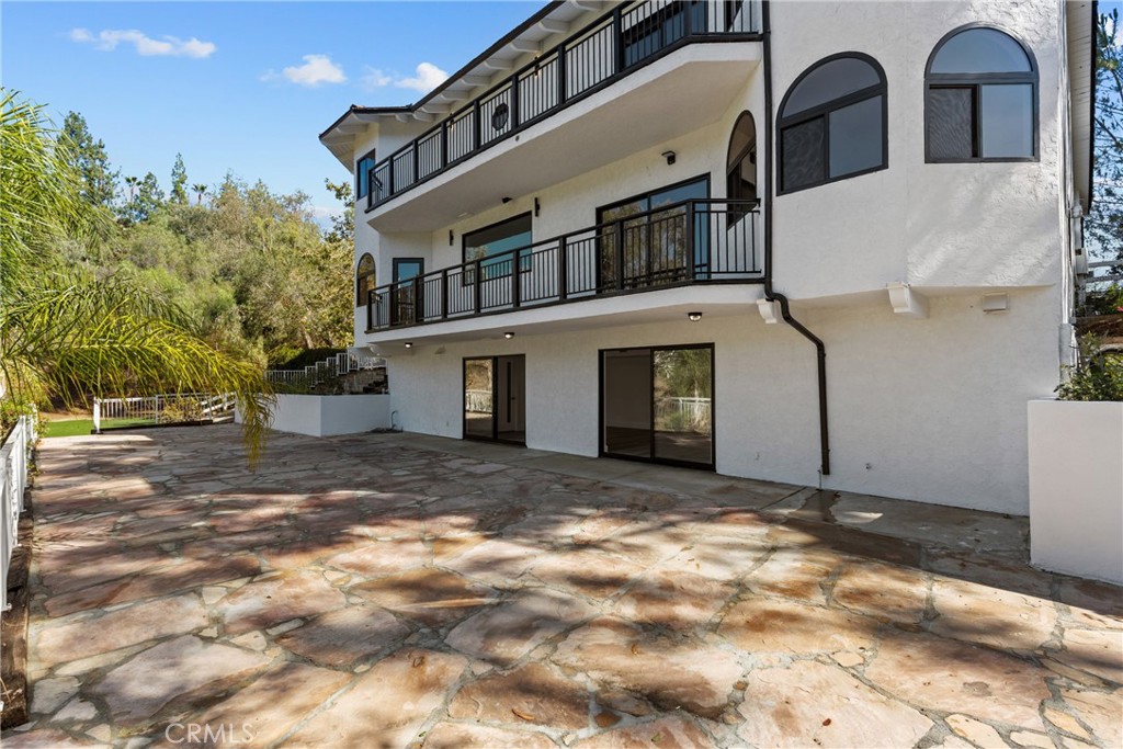 106 Buckskin Road Bell Canyon, CA 91307 - Photo 50 of 54 a front view of a house with a yard