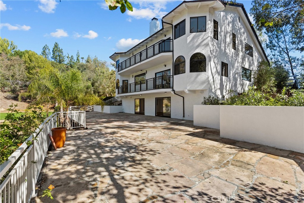 106 Buckskin Road Bell Canyon, CA 91307 - Photo 52 of 54 a front view of a house with a yard