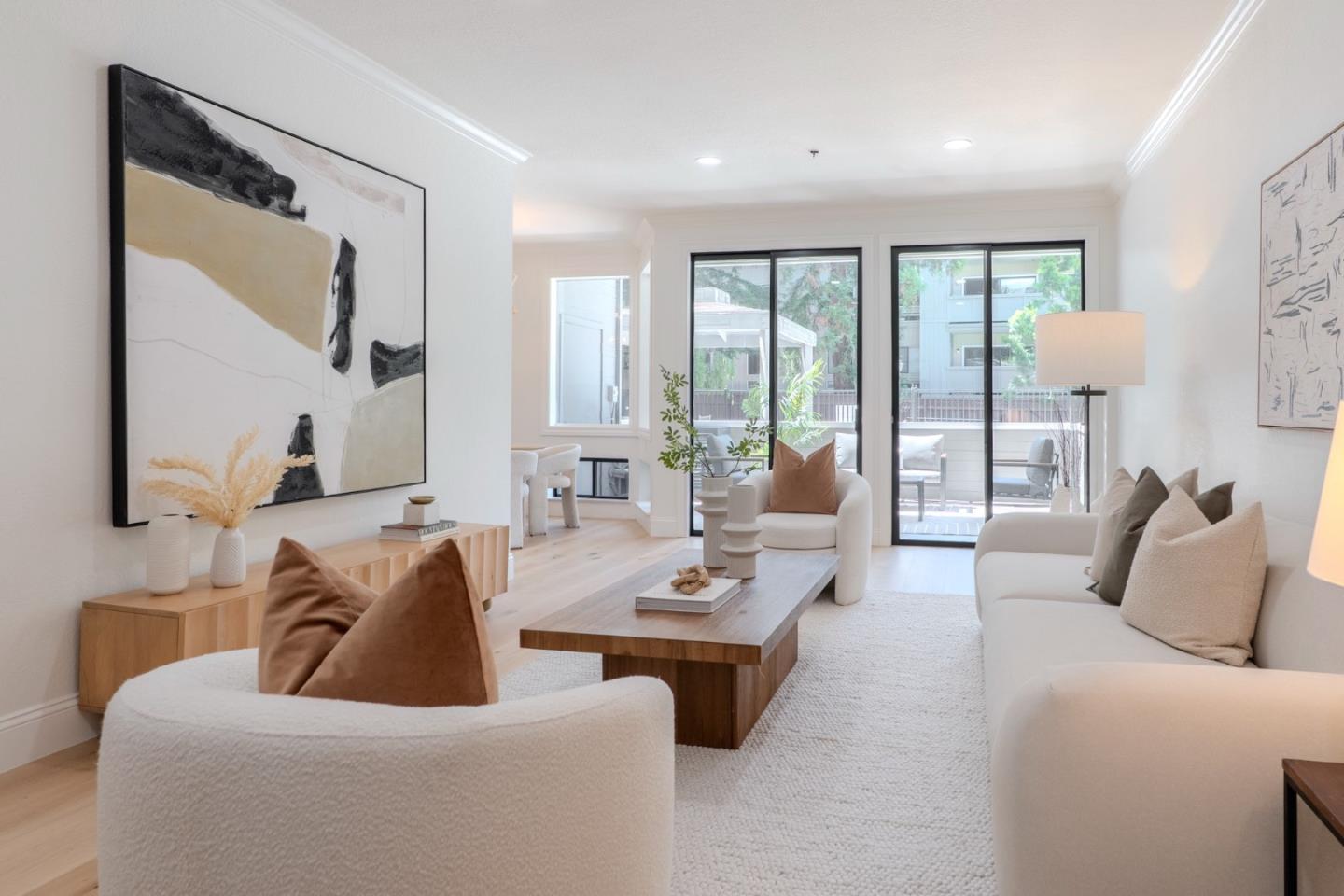 22330 Homestead Road, Unit 116 Cupertino, CA 95014 - Photo 4 of 30 a living room with furniture and a large window
