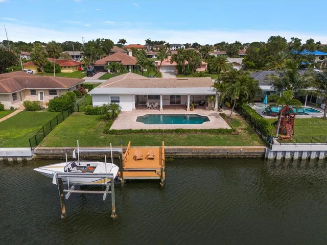 a outdoor space with patio lots of furniture and garden view