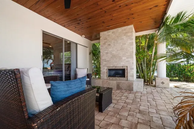 a outdoor space with patio lots of furniture and iron fence