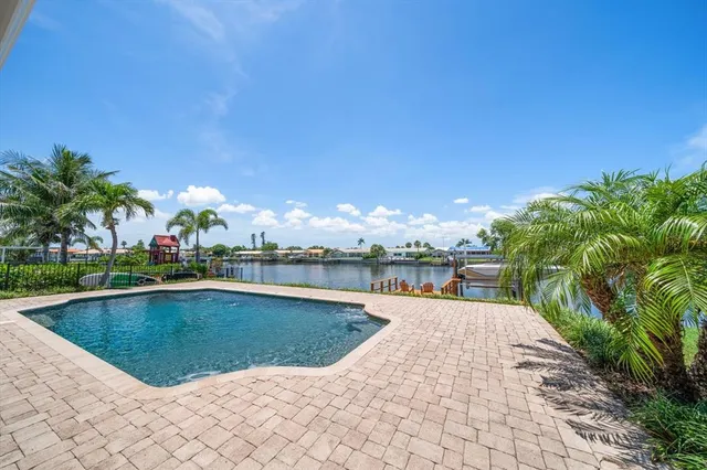 a small garden with a lake view
