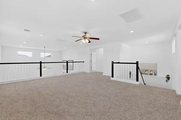 a view of a livingroom with a staircase
