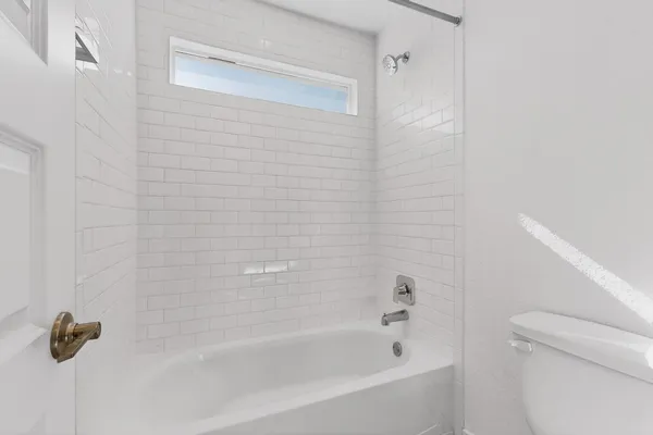 a bathroom with a bathtub