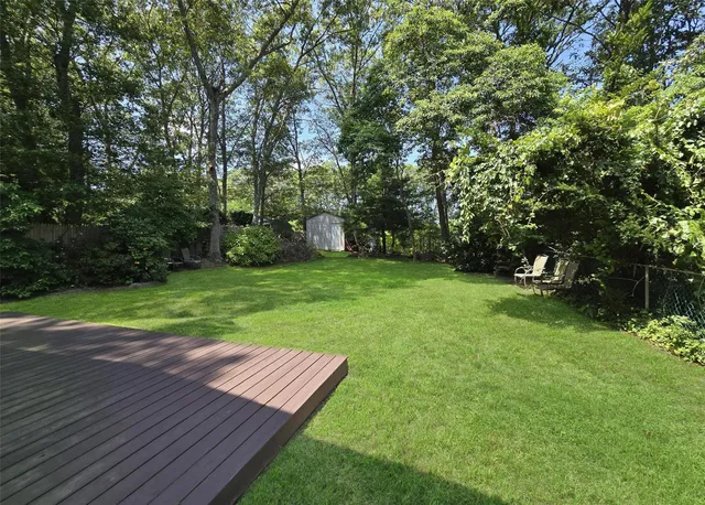 a view of a backyard with a garden