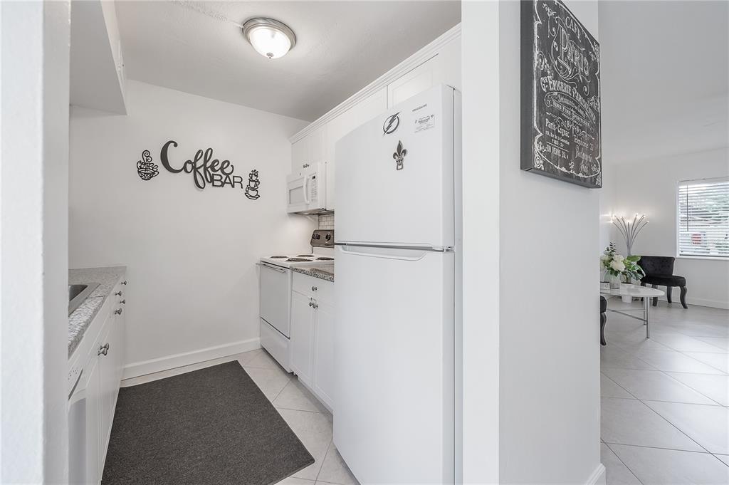 3206 West Azeele Street, Unit 129 Tampa, FL 33609 - Photo 13 of 30 a bathroom with a bathtub and a shower