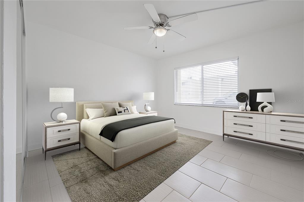 3206 West Azeele Street, Unit 129 Tampa, FL 33609 - Photo 14 of 30 a room with a bed and a window