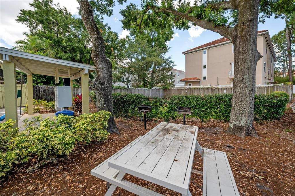 3206 West Azeele Street, Unit 129 Tampa, FL 33609 - Photo 27 of 30 front view of a house with a yard