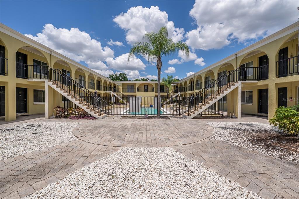 3206 West Azeele Street, Unit 129 Tampa, FL 33609 - Photo 29 of 30 a view of a house with a yard
