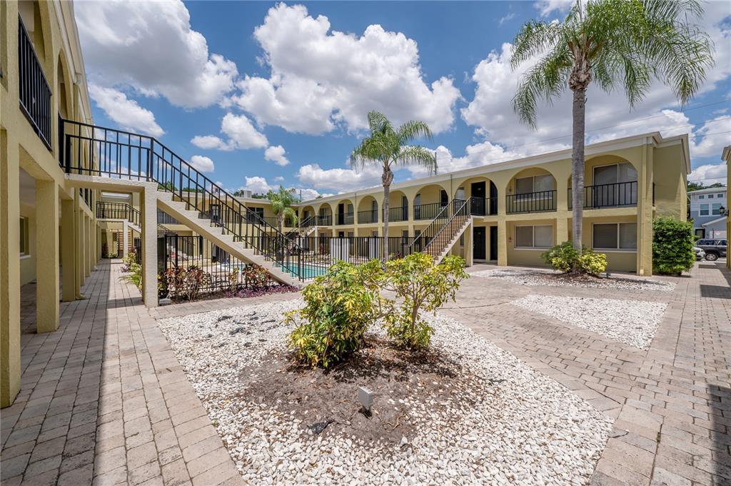 3206 West Azeele Street, Unit 129 Tampa, FL 33609 - Photo 30 of 30 a view of a house with a yard