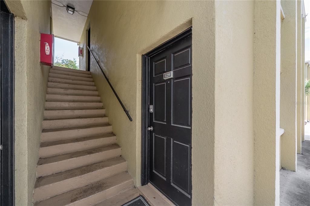 3206 West Azeele Street, Unit 129 Tampa, FL 33609 - Photo 3 of 30 a view of entryway with wooden floor
