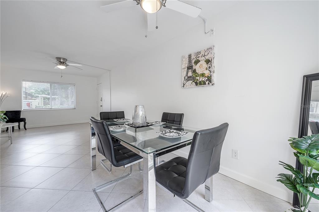 3206 West Azeele Street, Unit 129 Tampa, FL 33609 - Photo 7 of 30 a view of a dining room with furniture