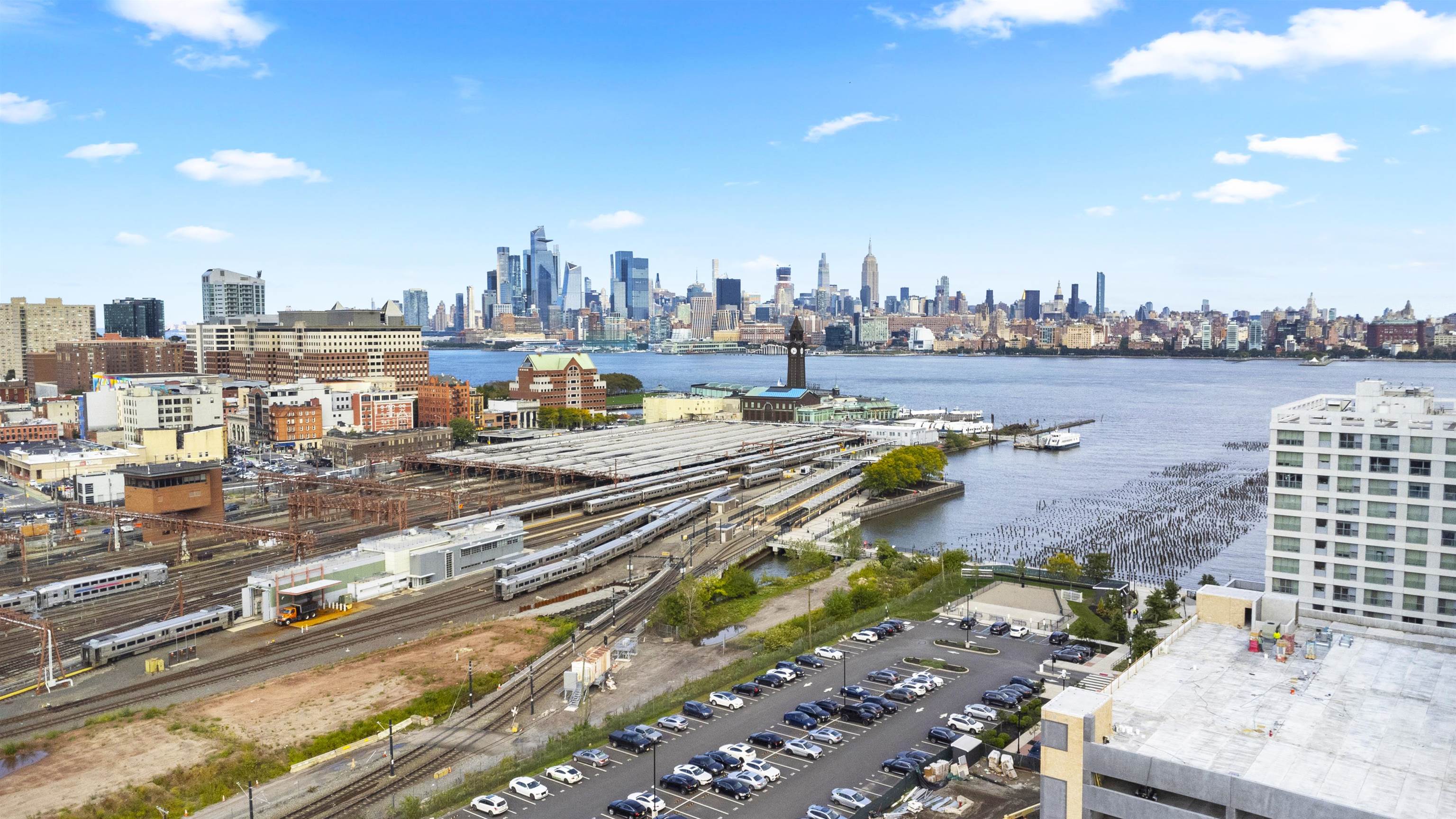 2 Shore Lane, Unit 404 Jersey City, NJ 07310 - Photo 22 of 34 a city view with tall buildings