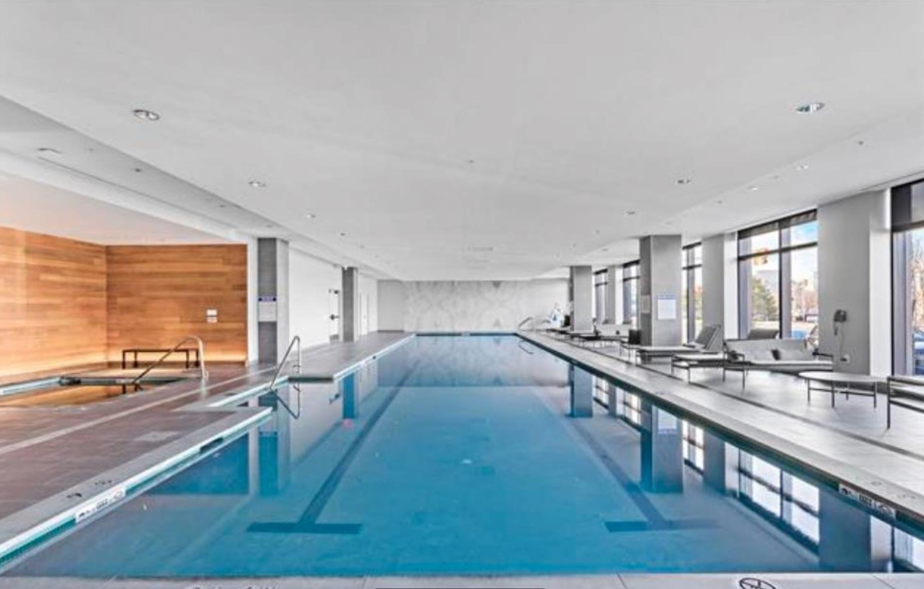 2 Shore Lane, Unit 404 Jersey City, NJ 07310 - Photo 28 of 34 a view of a living room and a kitchen