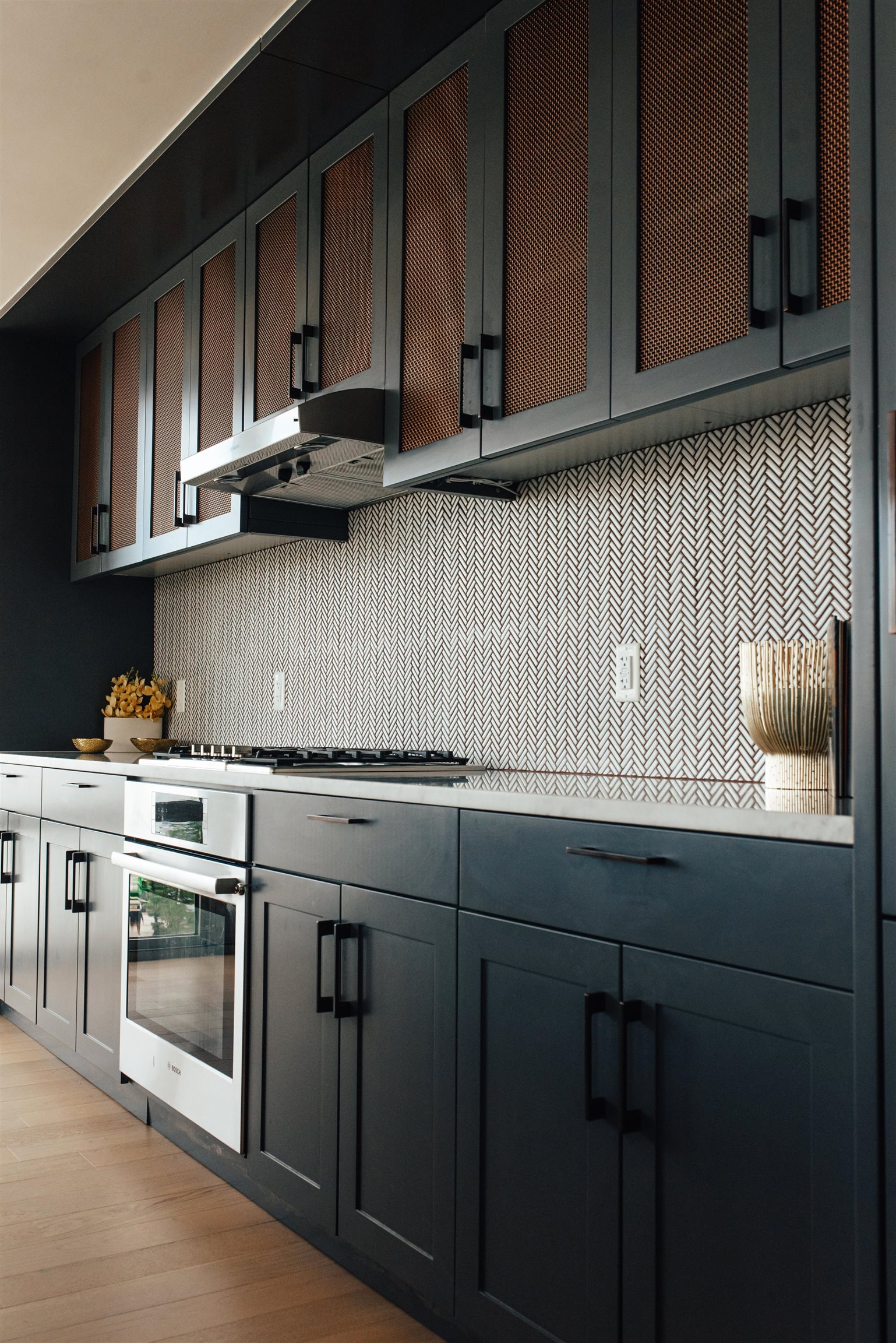 2 Shore Lane, Unit 404 Jersey City, NJ 07310 - Photo 9 of 34 a kitchen with stainless steel appliances wooden cabinets and a stove top oven