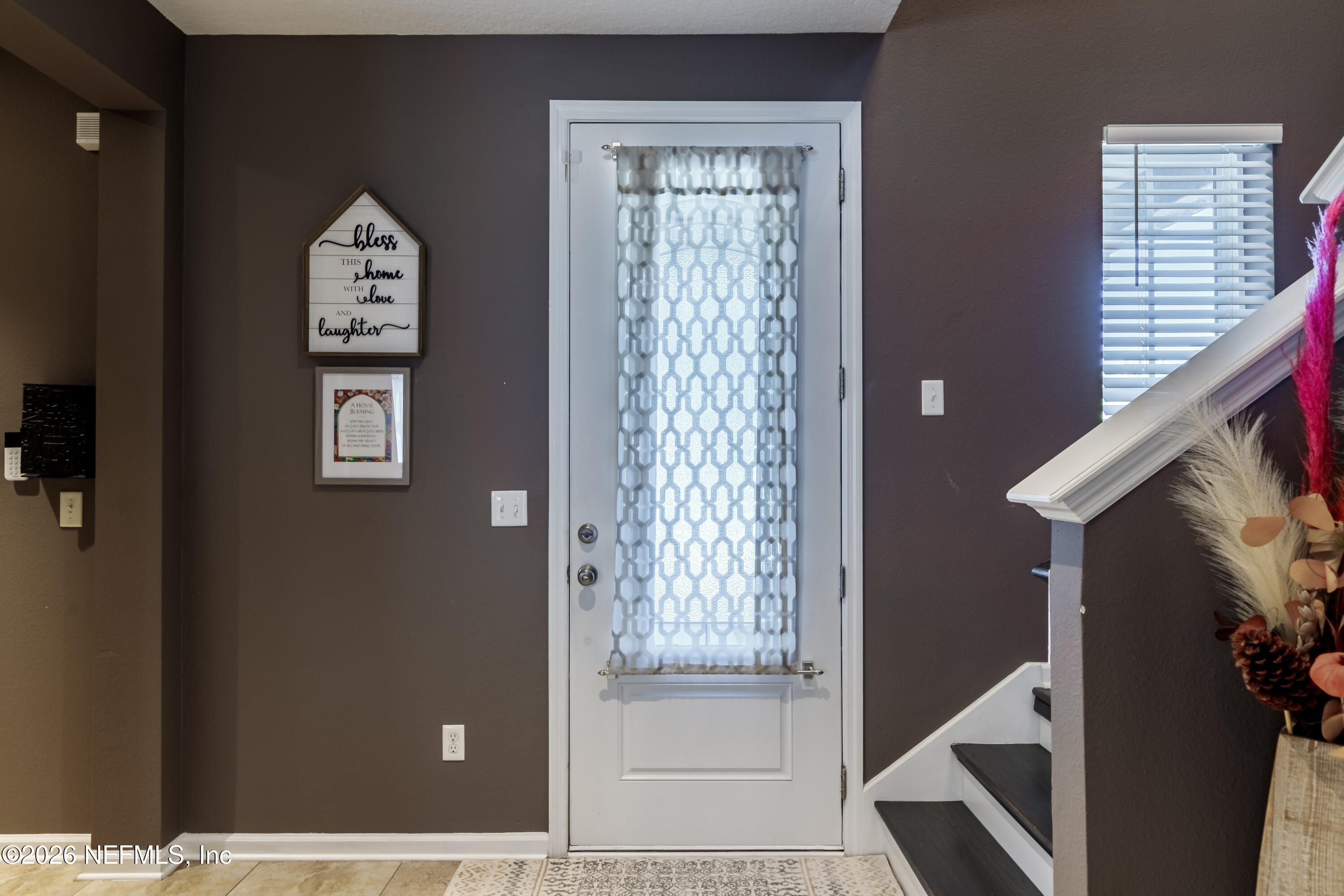 1252 Luffness Drive Jacksonville, FL 32221 - Photo 4 of 51 a view of front door with stairs