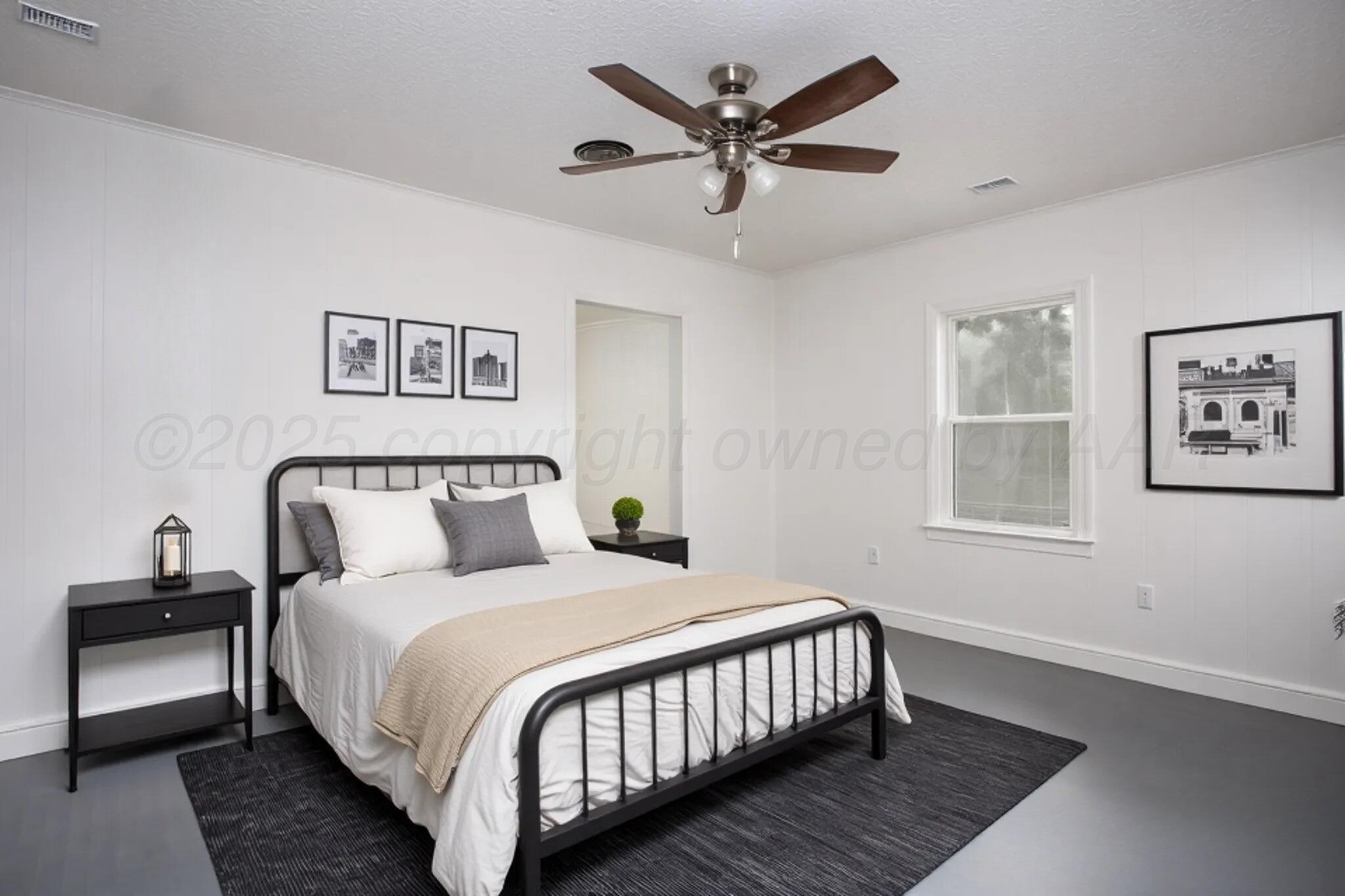 826 Sunset Terrace Amarillo, TX 79106 - Photo 18 of 28 a bedroom with a bed and a window