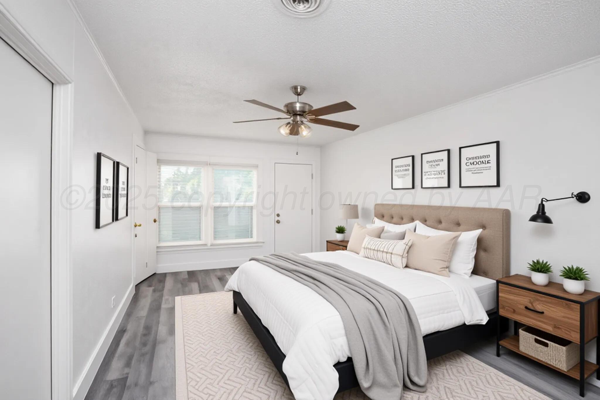 826 Sunset Terrace Amarillo, TX 79106 - Photo 24 of 28 a bedroom with a bed and window