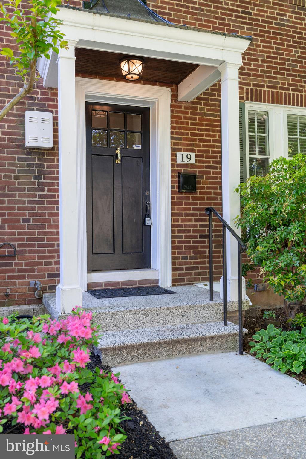 19 Dunkirk Road Baltimore, MD 21212 - Photo 2 of 37 a front view of a house with flowers