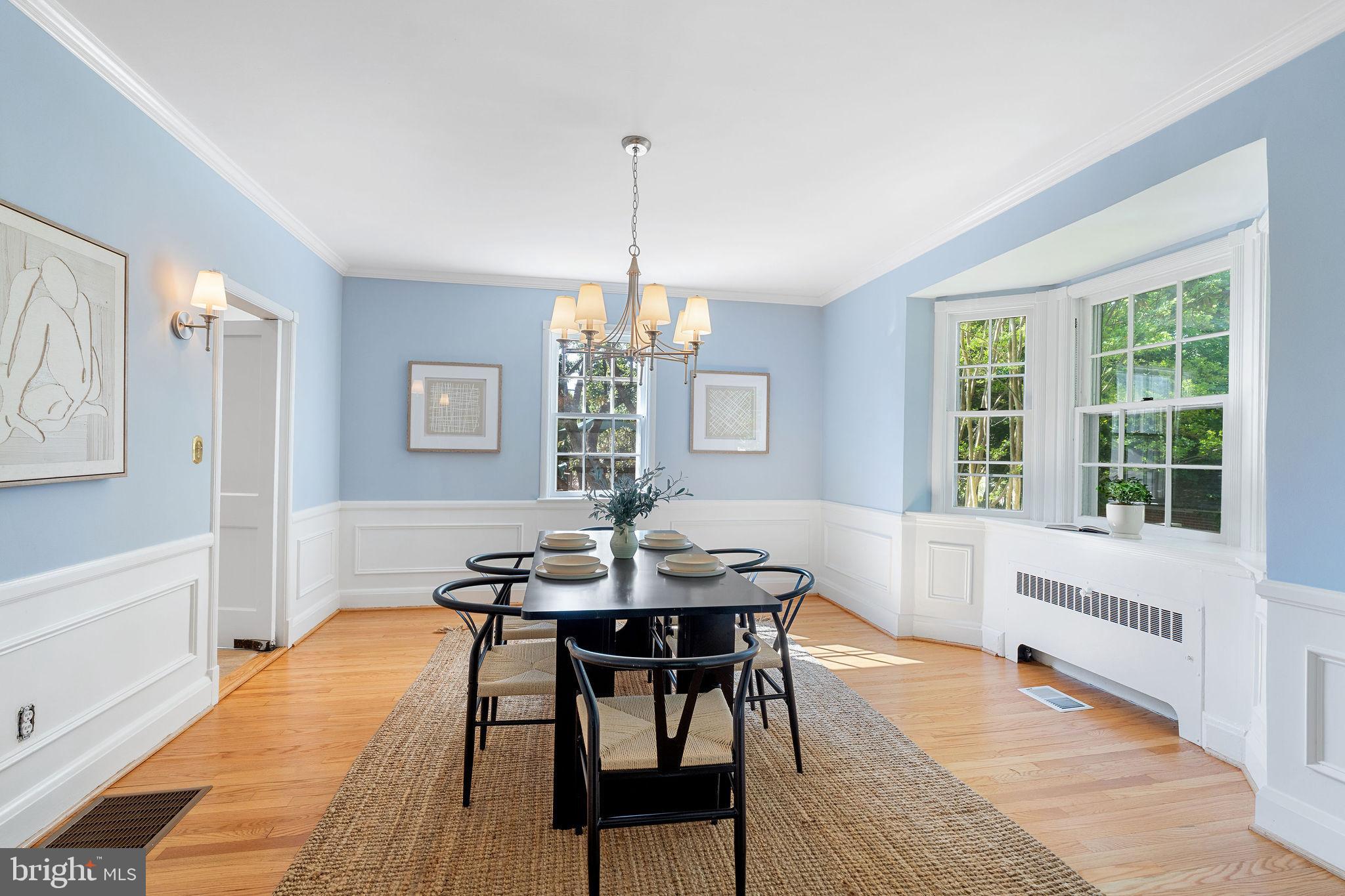19 Dunkirk Road Baltimore, MD 21212 - Photo 7 of 37 a dining room with furniture a chandelier and wooden floor