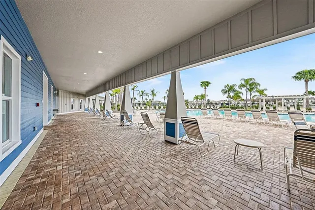 a group of people sitting at tables in a room