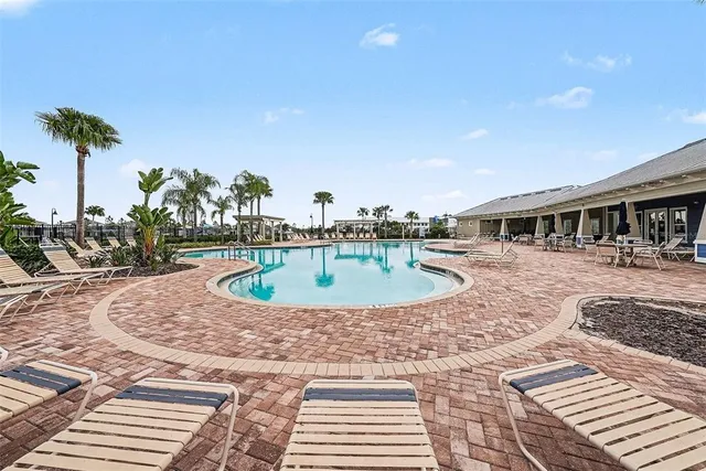a view of a park with swings and slides