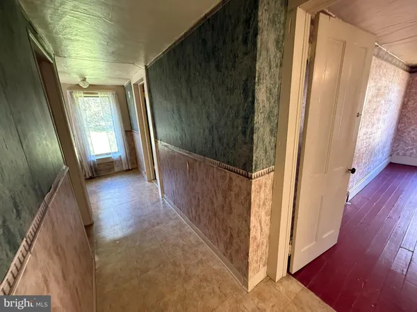 a bathroom with a tub and shower