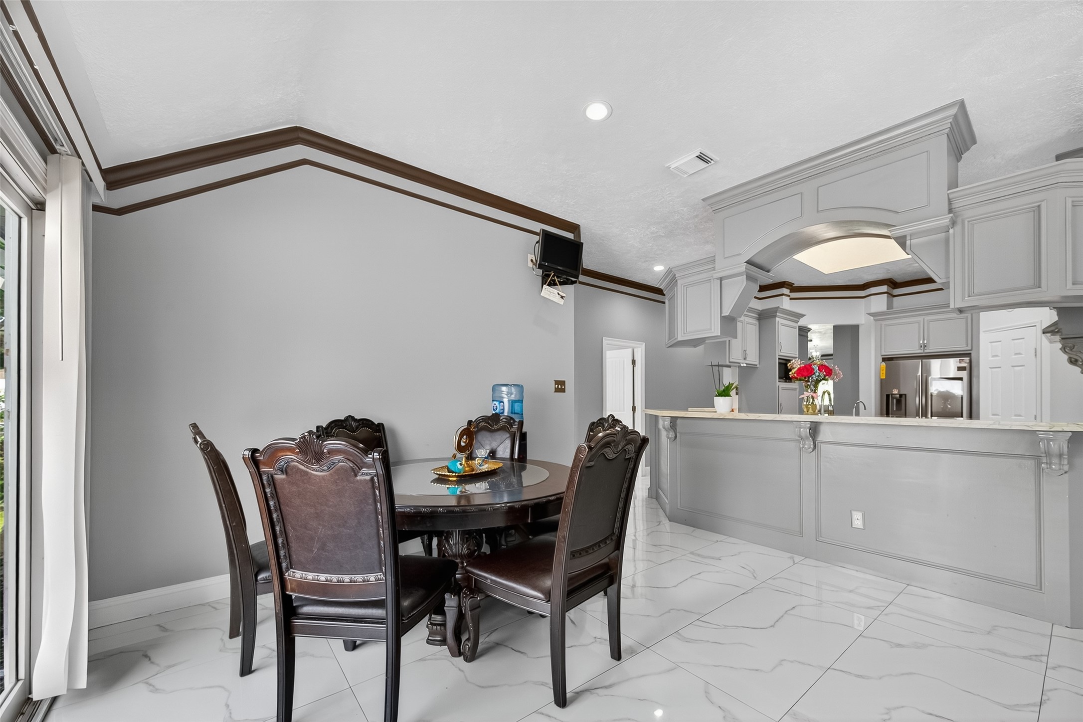 4917 Sycamore Avenue Pasadena, TX 77503 - Photo 16 of 46 a dining room with furniture and window
