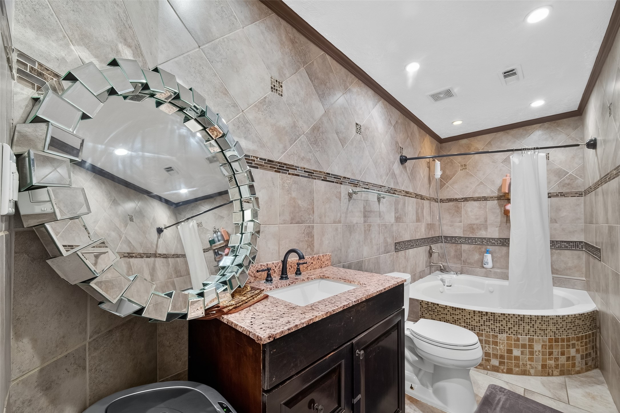 4917 Sycamore Avenue Pasadena, TX 77503 - Photo 24 of 46 a bathroom with a sink a toilet and shower