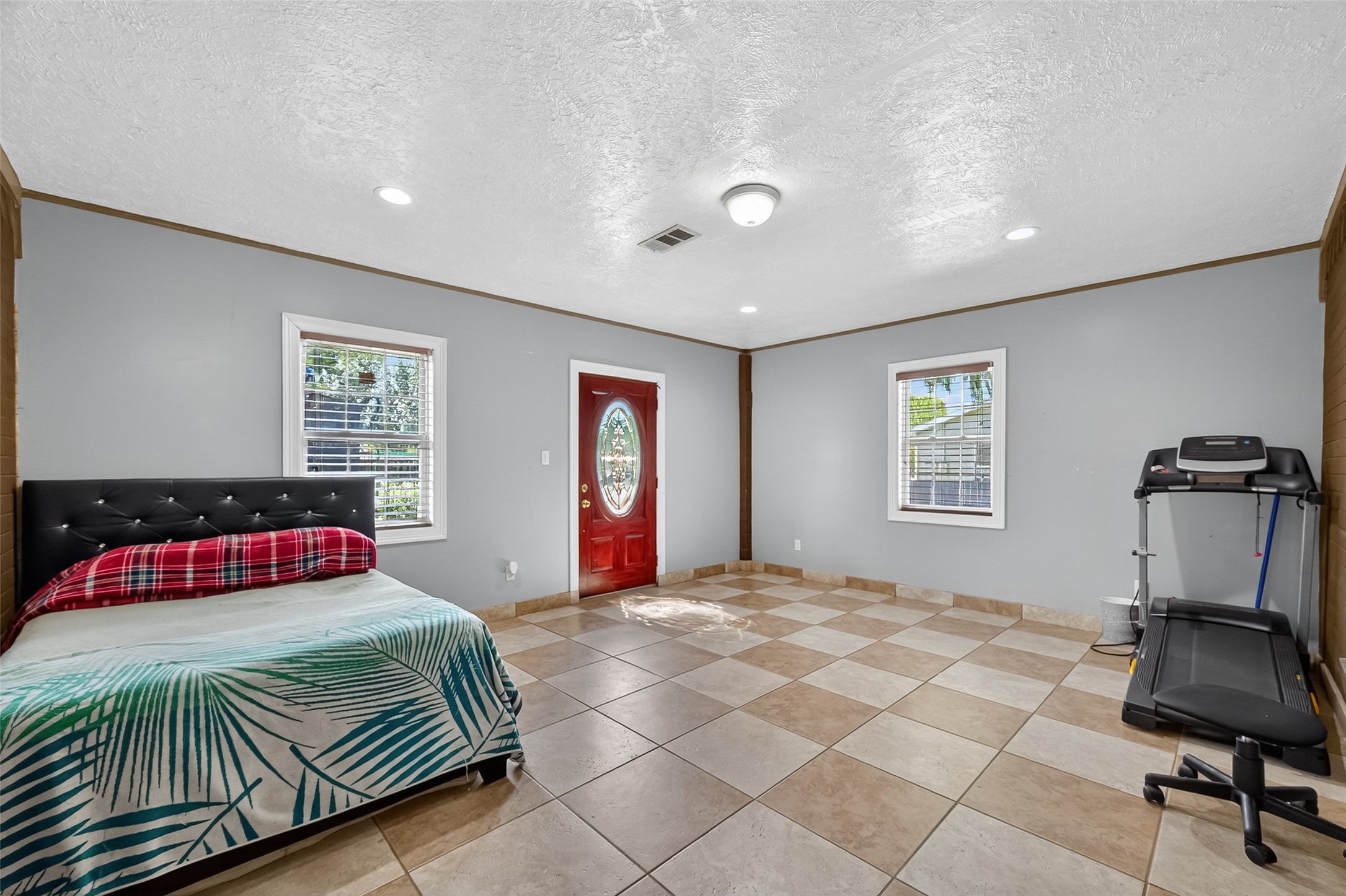 4917 Sycamore Avenue Pasadena, TX 77503 - Photo 25 of 46 a bedroom with a large bed and a window