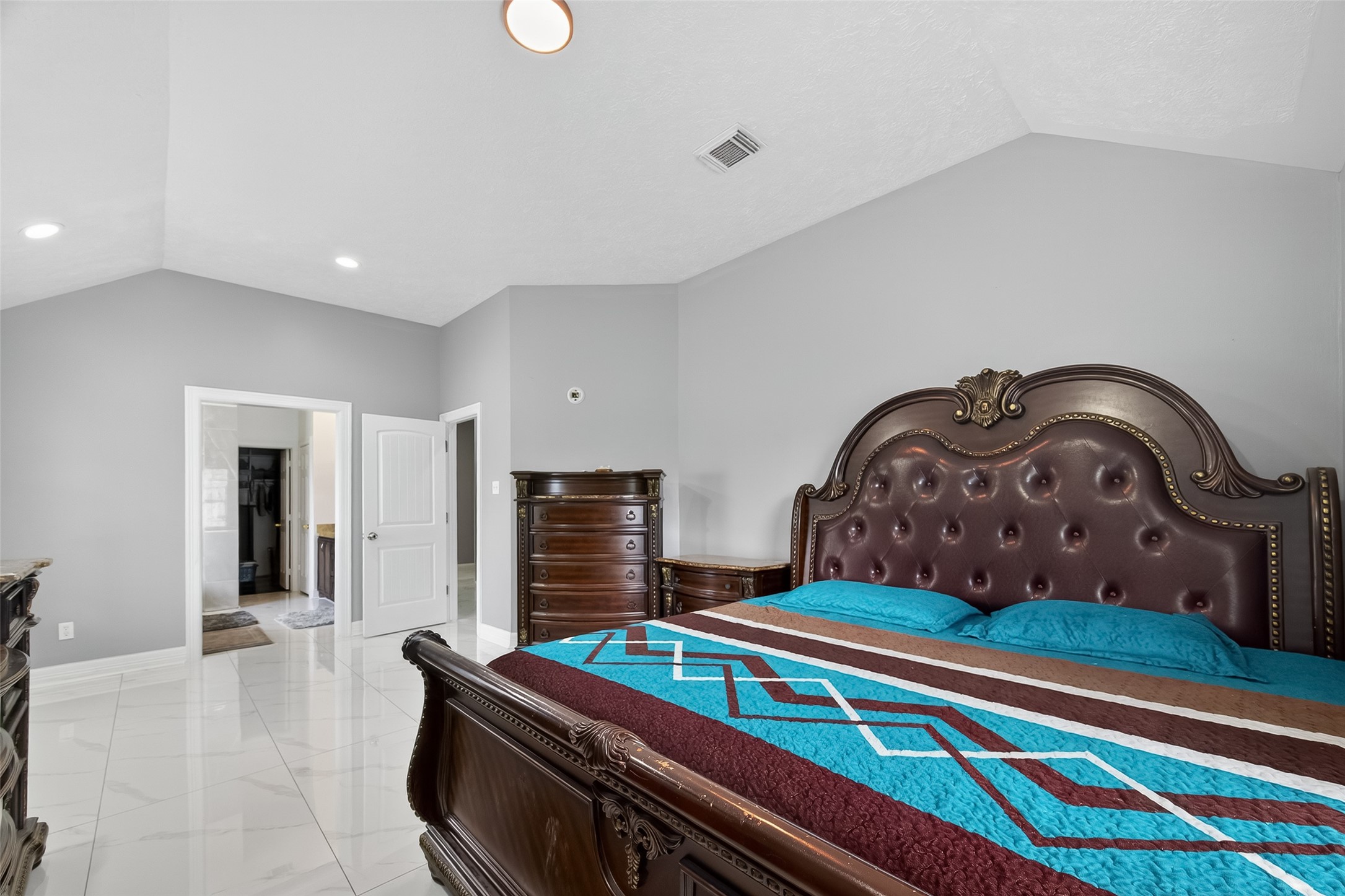 4917 Sycamore Avenue Pasadena, TX 77503 - Photo 35 of 46 a bedroom with a bed and dresser