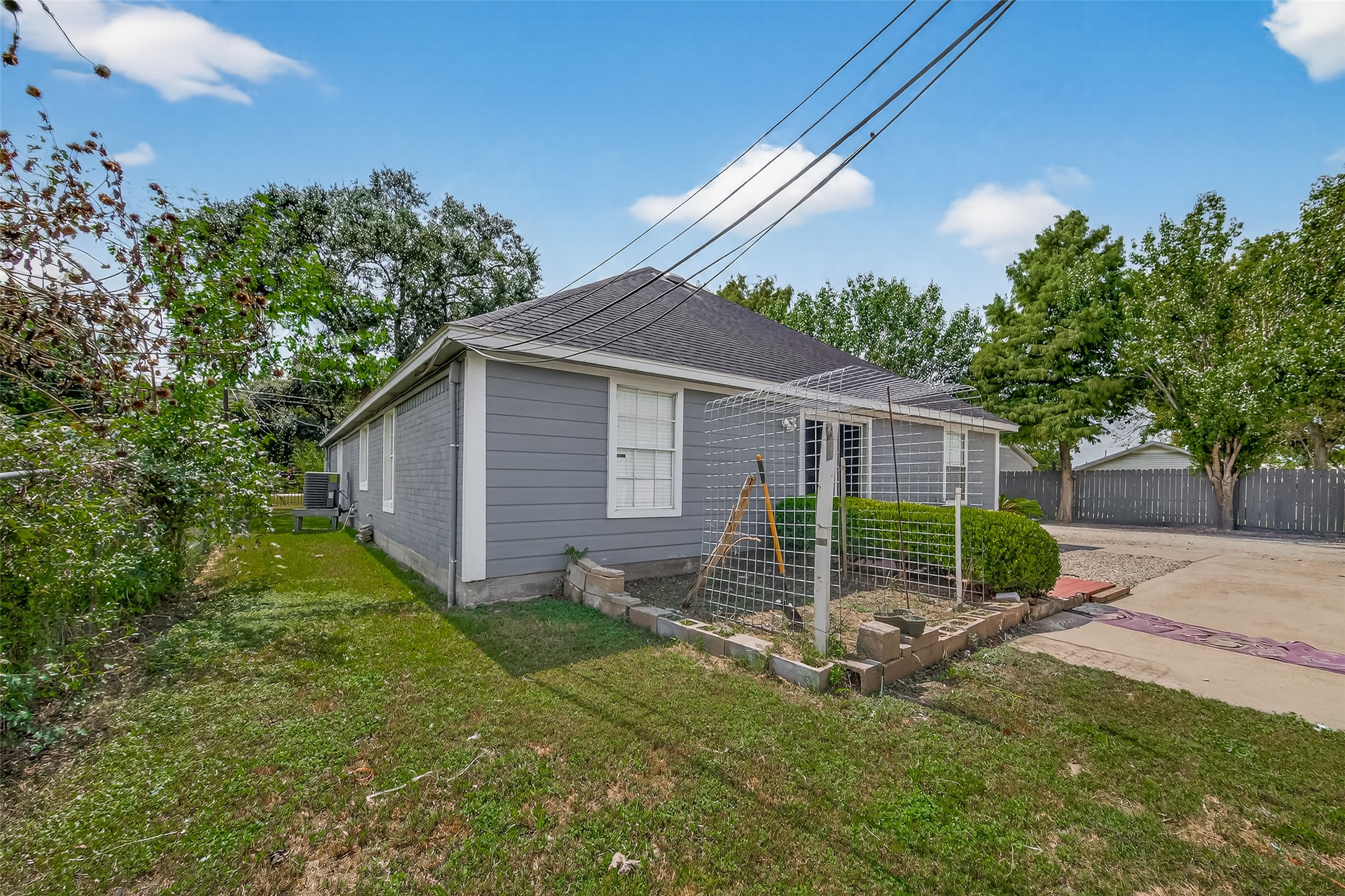 4917 Sycamore Avenue Pasadena, TX 77503 - Photo 41 of 46 a view of a backyard with a garden and plants