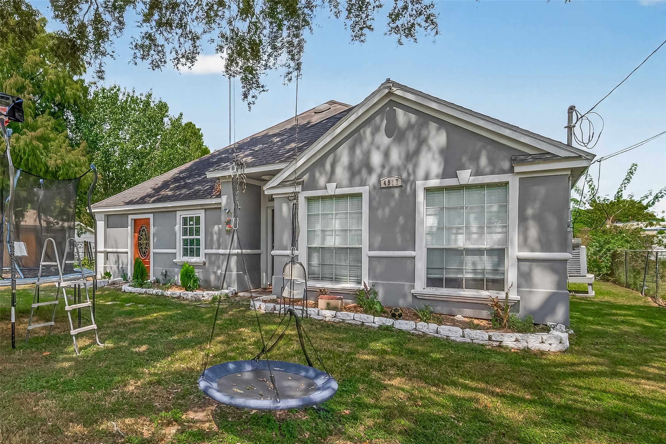 4917 Sycamore Avenue Pasadena, TX 77503 - Photo 5 of 46 a backyard of a house with yard and barbeque oven