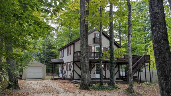 $330,000 | 2552 East Birch Court, Unit LOT: 76, Cedar, MI 49621