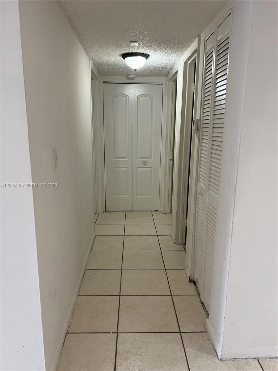 8400 Southwest 133rd Avenue Road, Unit 121 Miami, FL 33183 - Photo 43 of 43 a view of an empty room and a window