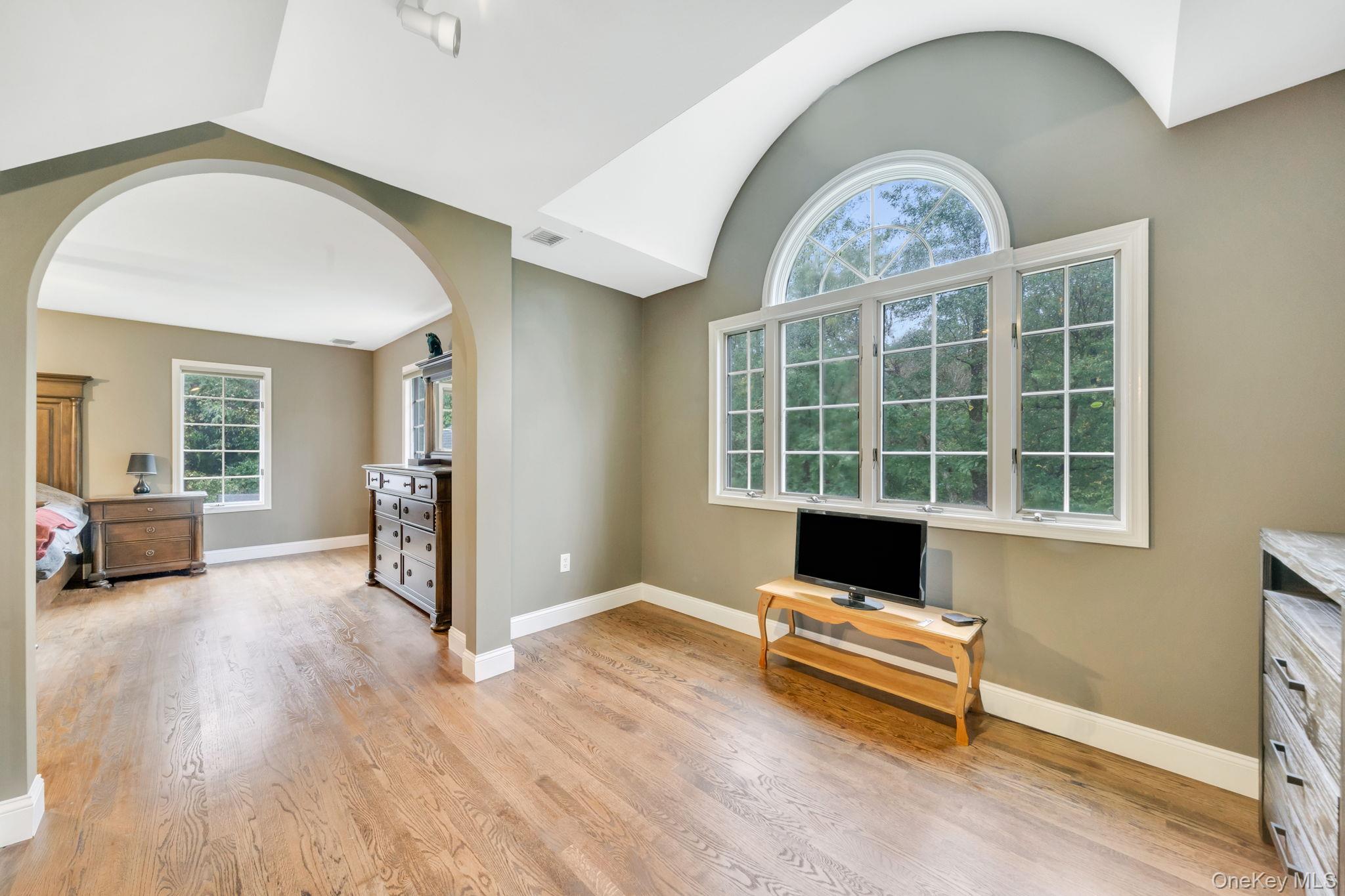 27 Tower Hill Road Shoreham, NY 11786 - Photo 27 of 49 a living room with furniture and a window