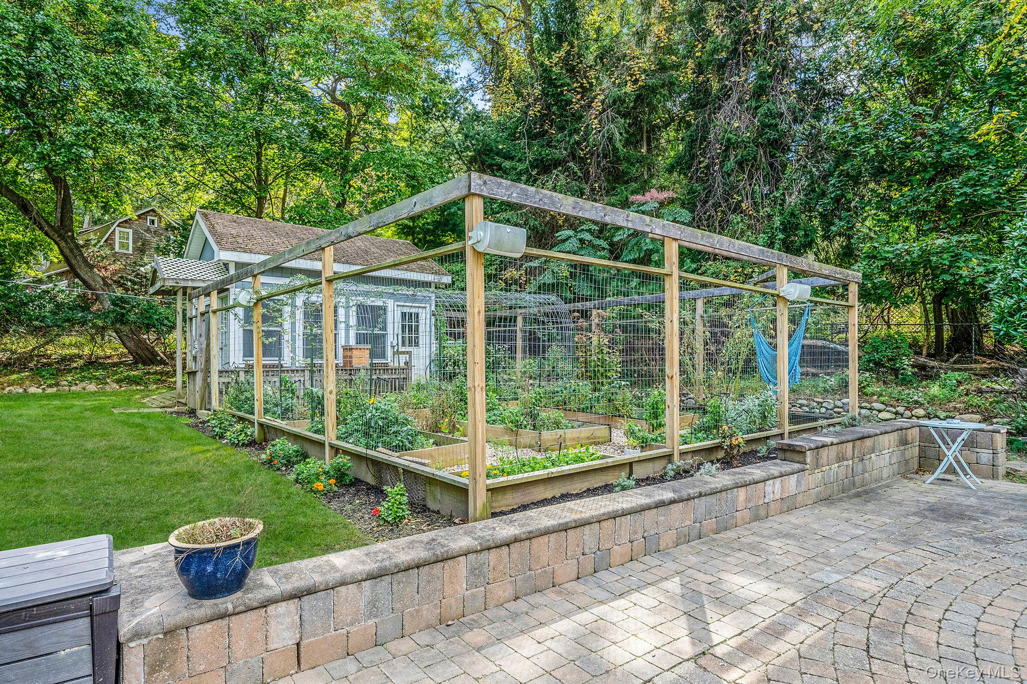 27 Tower Hill Road Shoreham, NY 11786 - Photo 41 of 49 a house view with a garden space