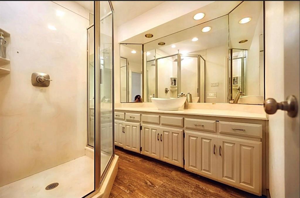 3439 South 271 Bonham, TX 75418 - Photo 15 of 36 a bathroom with a double vanity sink mirror and shower