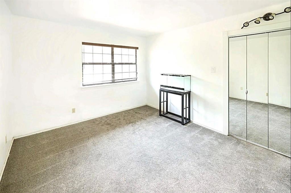 3439 South 271 Bonham, TX 75418 - Photo 17 of 36 an empty room with windows and closet