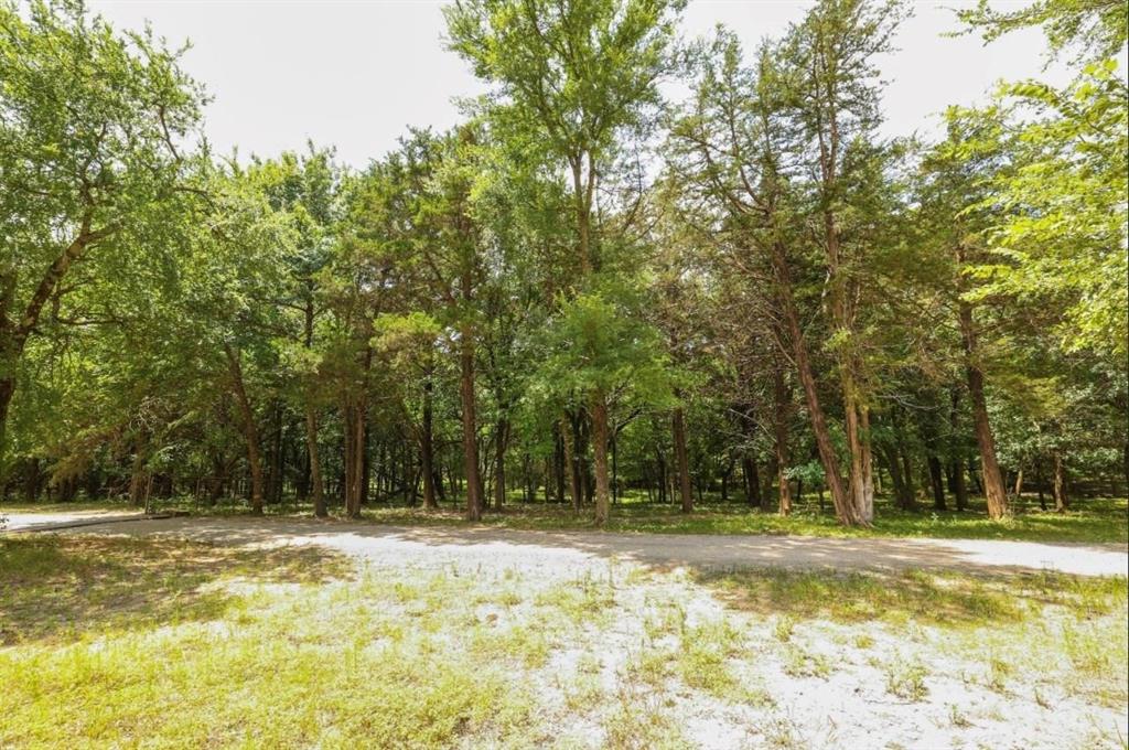 3439 South 271 Bonham, TX 75418 - Photo 31 of 36 a view of swimming pool with trees