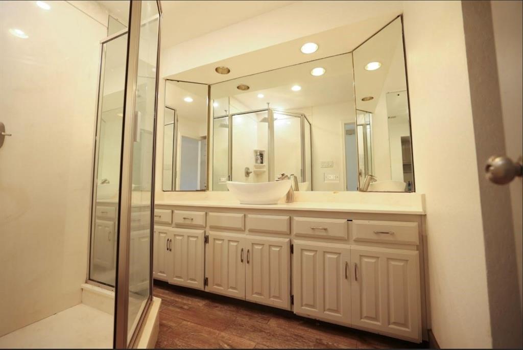 3439 South 271 Bonham, TX 75418 - Photo 7 of 36 a bathroom with a granite countertop sink mirror and double